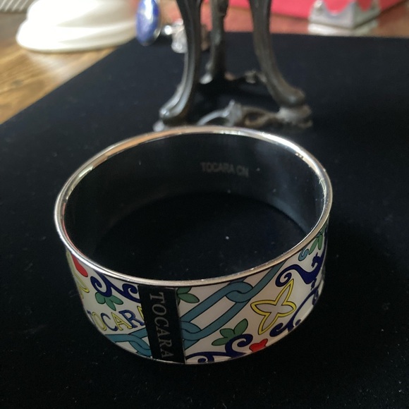 Colorful Enamel Bracelet Vibrant floral & geometric patterns. Features branding. - Picture 11 of 14